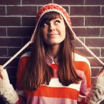 young-smiling-girl-dressed-in-color-clothes